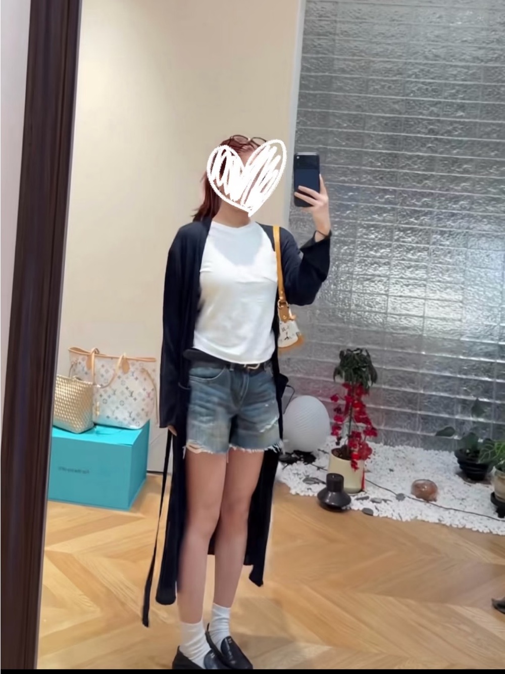 Women’s Distressed Blue Denim Shorts